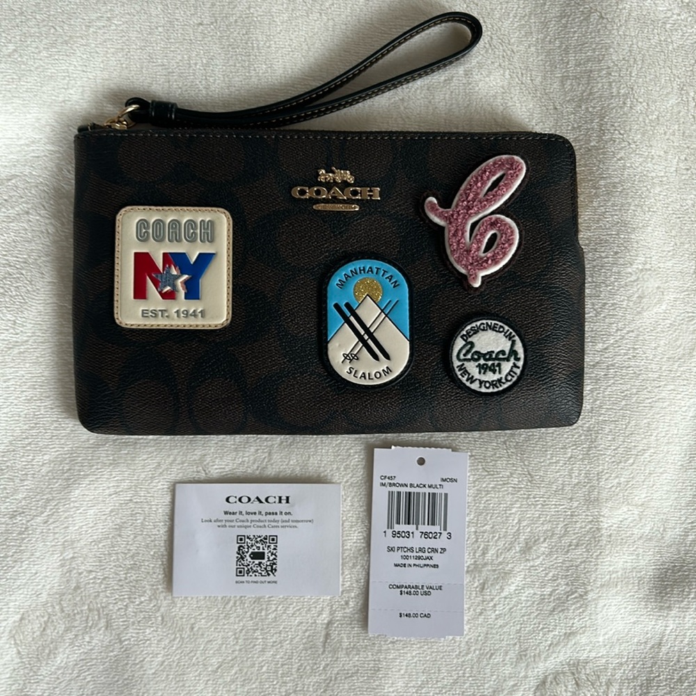 NWT Coach large wristlet with appliqués